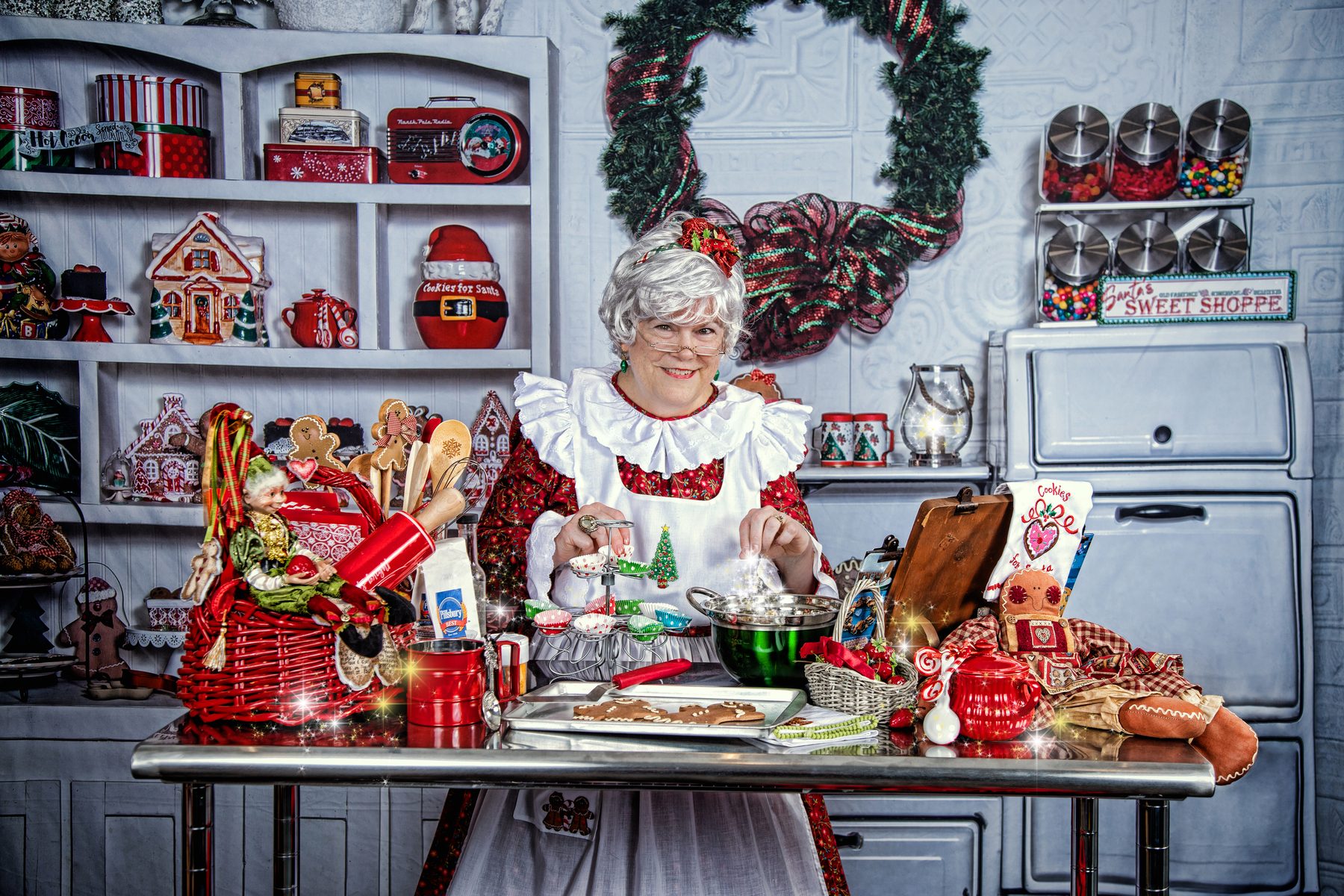 Santa Jay and Mrs. Claus in professional Christmas attire